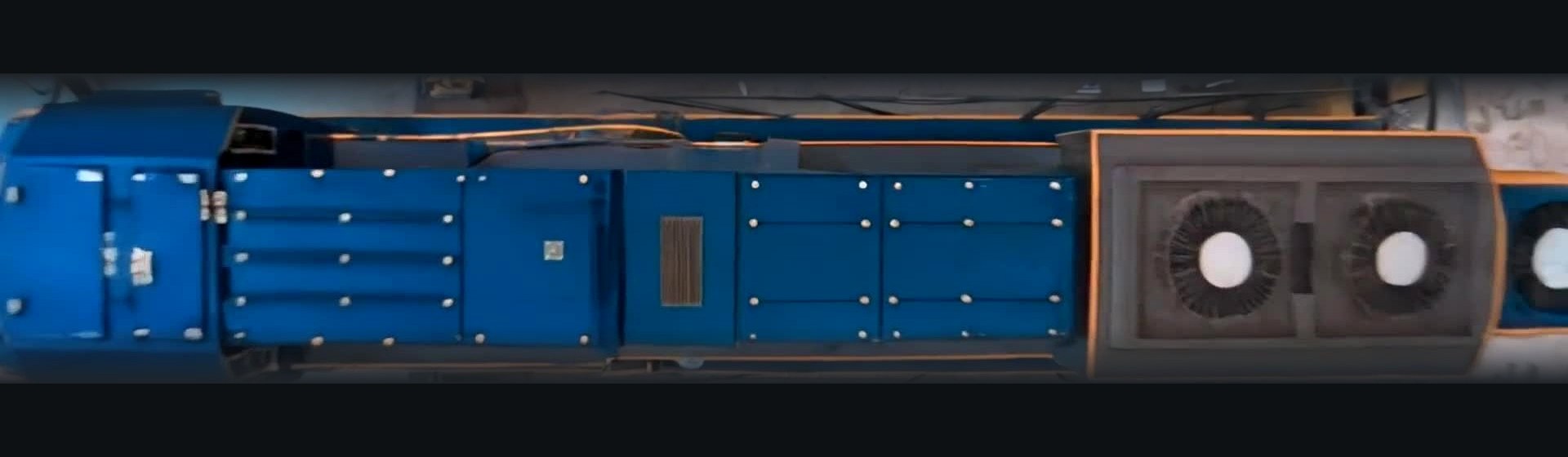 Blue locomotive with six Sentinel camera positions showing front, rear and two cameras on each side